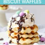A STACK OF MINI WAFFLES TOPPED WITH WHIPPED CREAM AND CANDY EGGS