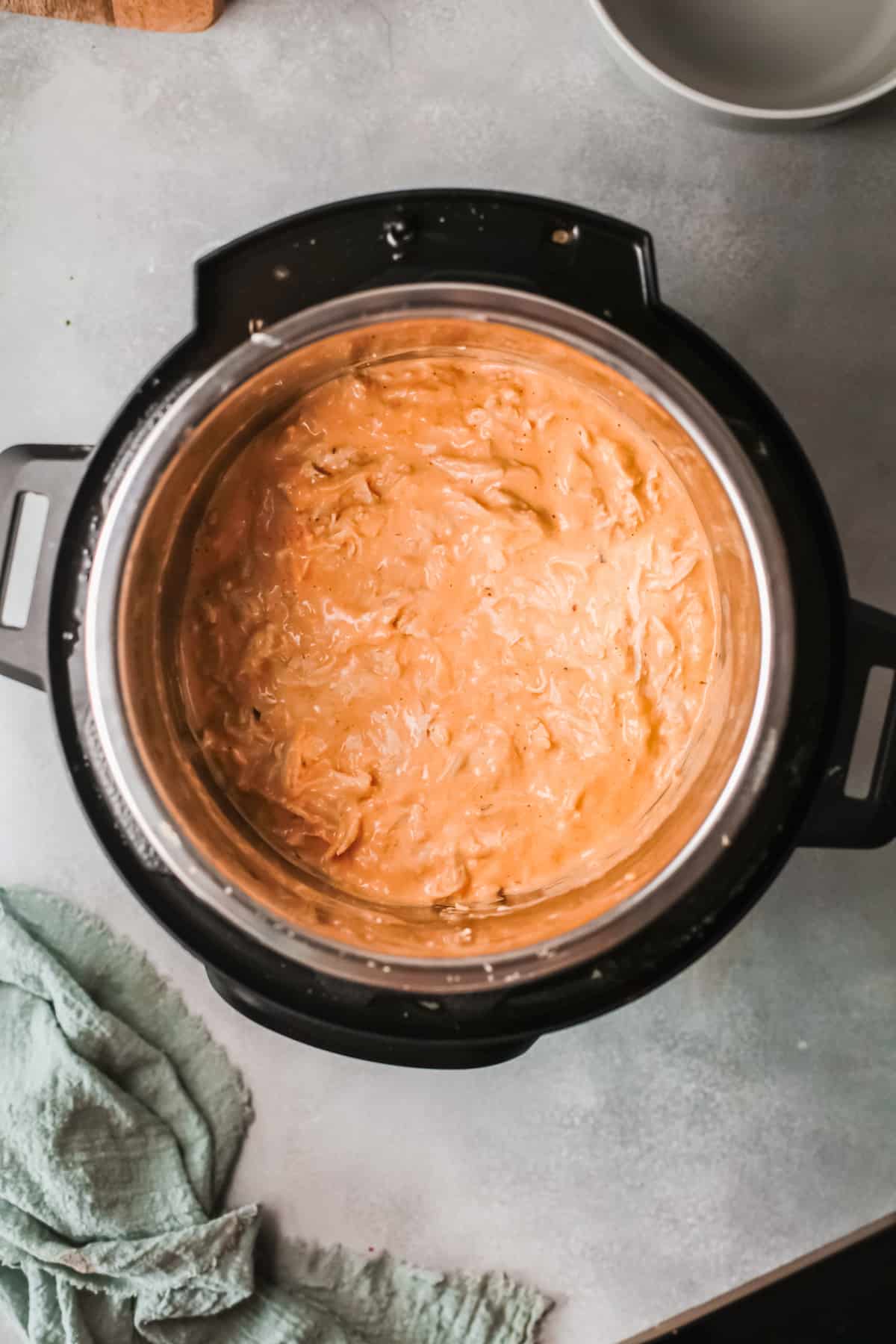 top down view of the finished buffalo chicken dip inside the instant pot