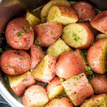 close up view of the garlic butter red potatoes inside the instant pot