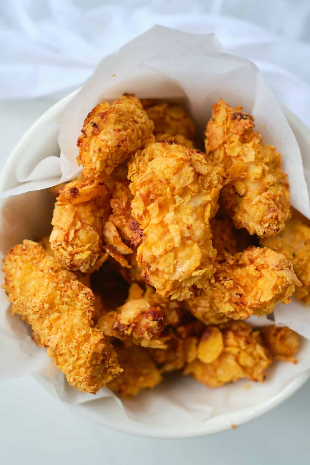 close up view of the completed air fryer popcorn chicken
