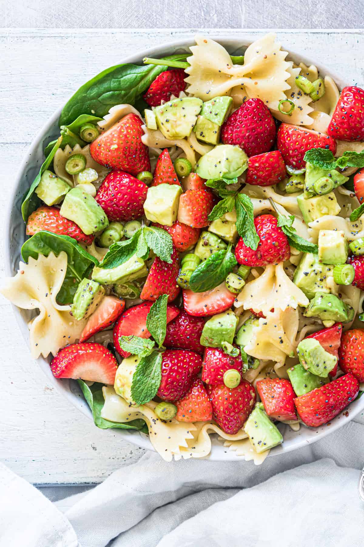 top down view of the finished strawberry avocado pasta salad recipe