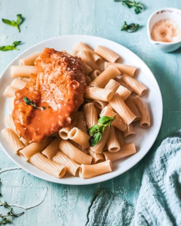 the finished cajun chicken recipe served with pasta