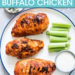 3 BUFFALO CHICKEN BREASTS ON A PLATE WITH CELERY AND BLUE CHEESE ON THE SIDE