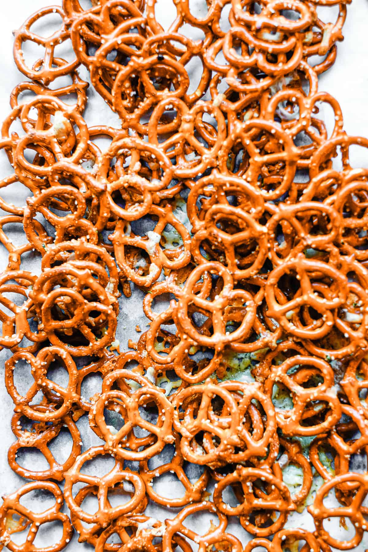  seasoned ranch pretzels on a baking tray