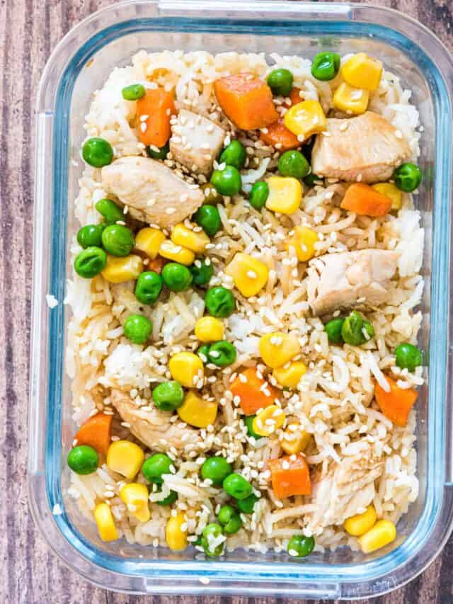 a portion of instant pot chicken fried rice in a glass meal storage container