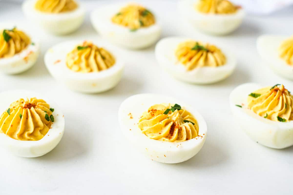 the finished deviled eggs on a countertop and ready to serve