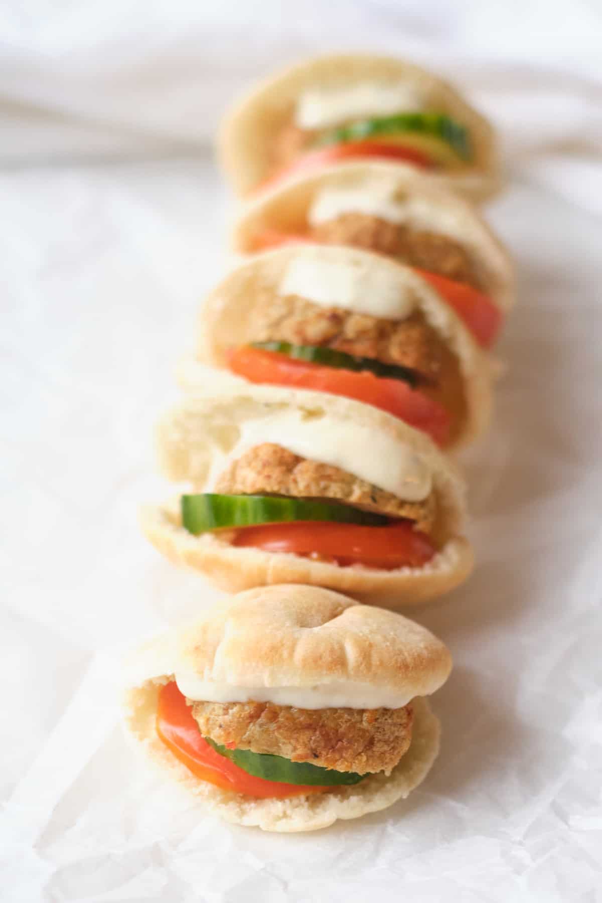 a row of completed meatball pita pockets