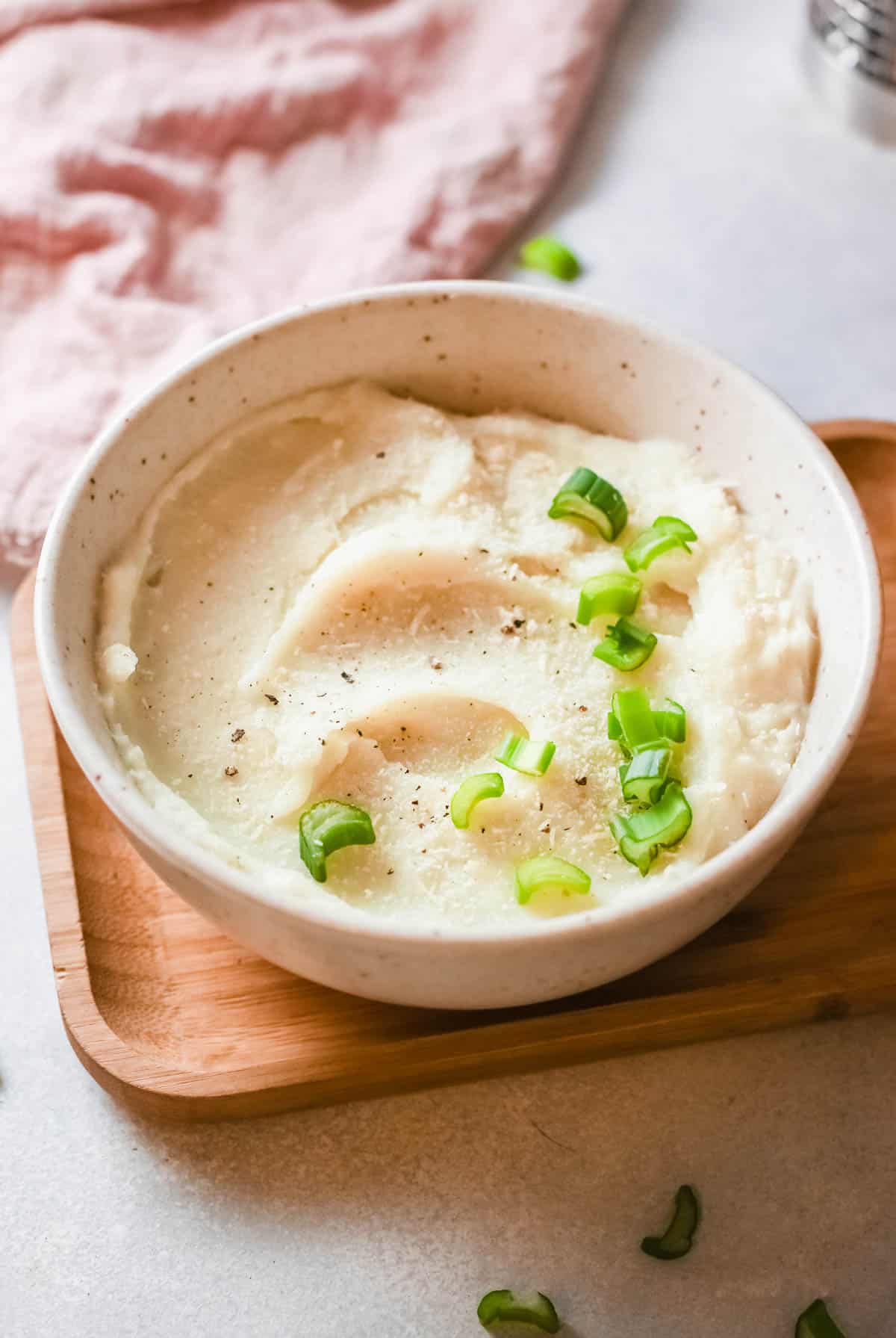 garlic mashed potatoes served in a white bowl
