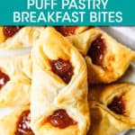 PUFF PASTRIES WITH FRUIT FILLING IN A PILE ON A PLATE
