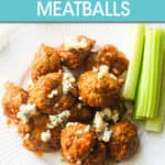 buffalo chicken meatballs on a plate with blue cheese crumbles and a side of celery sticks