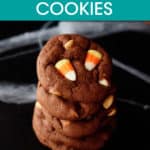 a stack of five chocolate cookies with candy corn