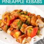 a pile of chicken pineapple kebabs on a plate