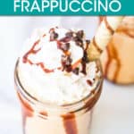 mocha frappe in a jar garnished with whipped cream and chocolate pieces