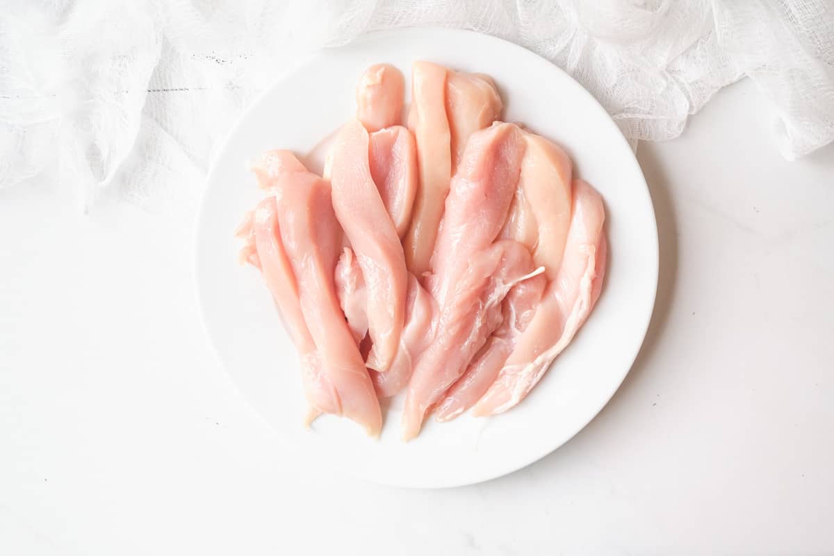 top down view of a portion of raw chicken tender