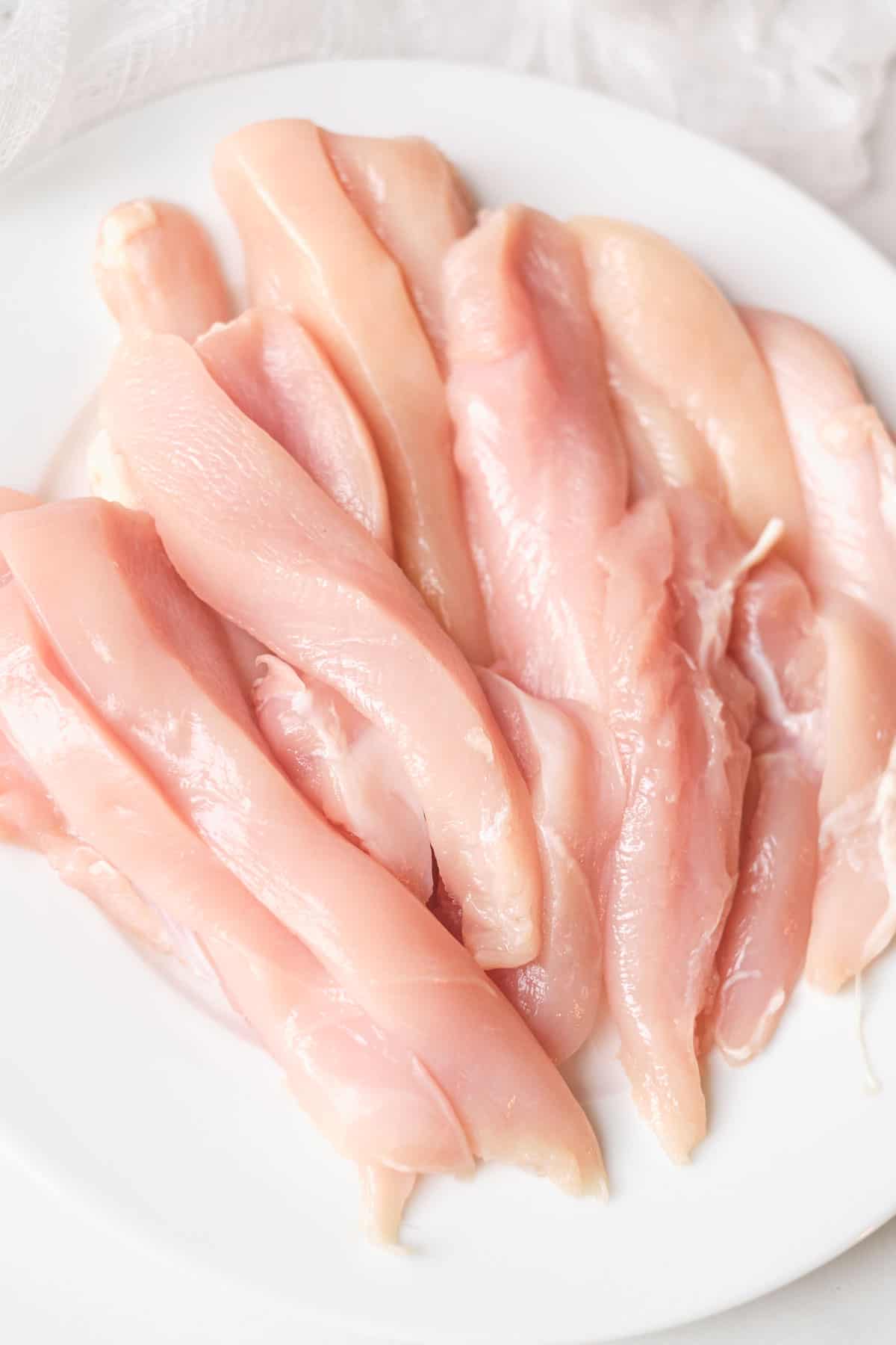 chicken tender on a white plate