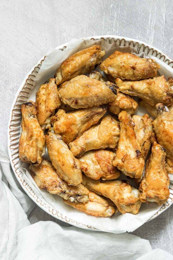 the completed frozen chicken wings in air fryer recipes served on a plate
