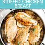 four stuffed chicken breasts in a pan garnished with herbs