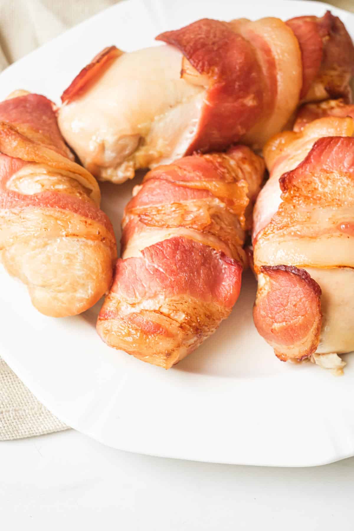 close up view of the completed bacon wrapped chicken breast recipe