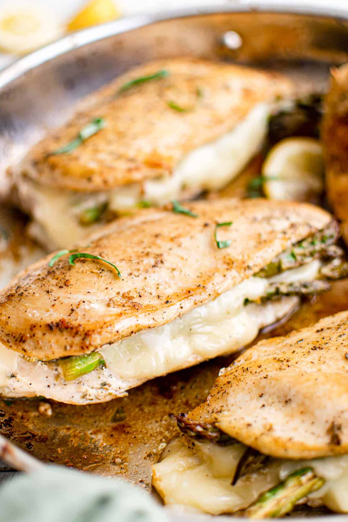 close up view of the finished asparagus stuffed chicken breast