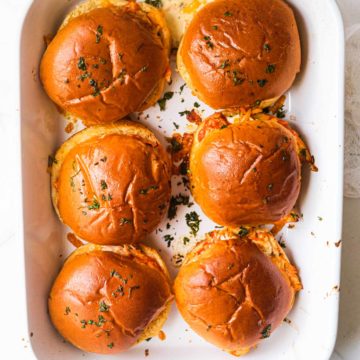 top down view of the buffalo chicken sliders inside the baking dish
