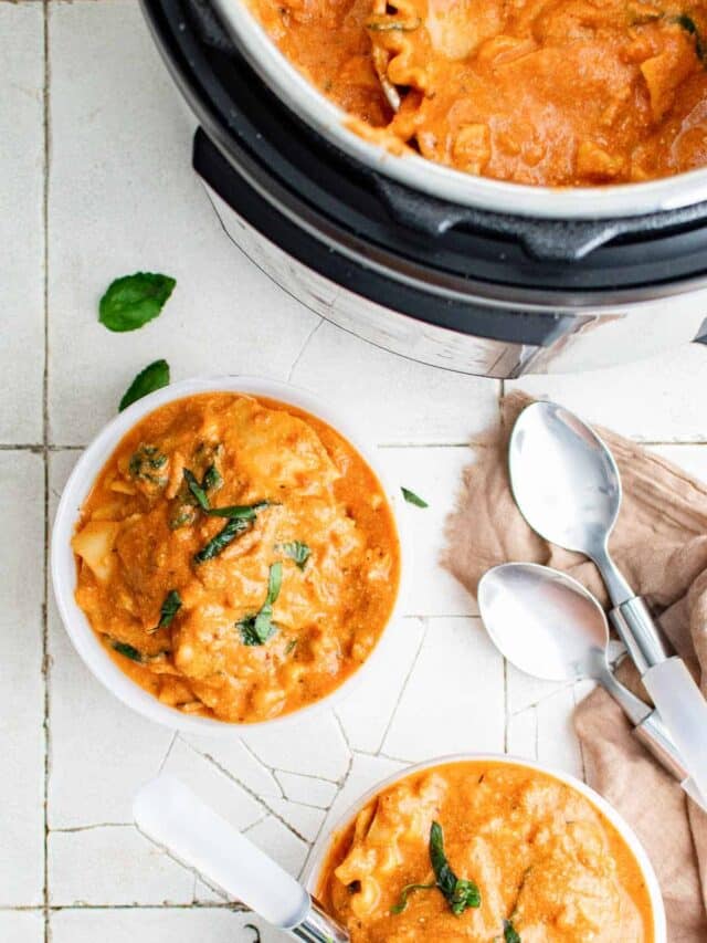 two bowls of instant pot lasagna soup sitting in front of the instant pot