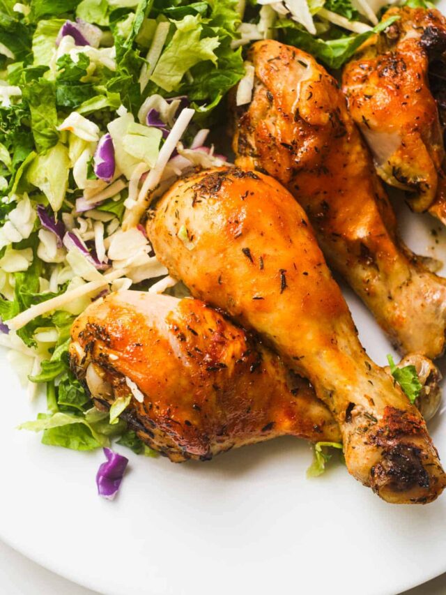 a serving of instant pot chicken drumsticks with a green salad