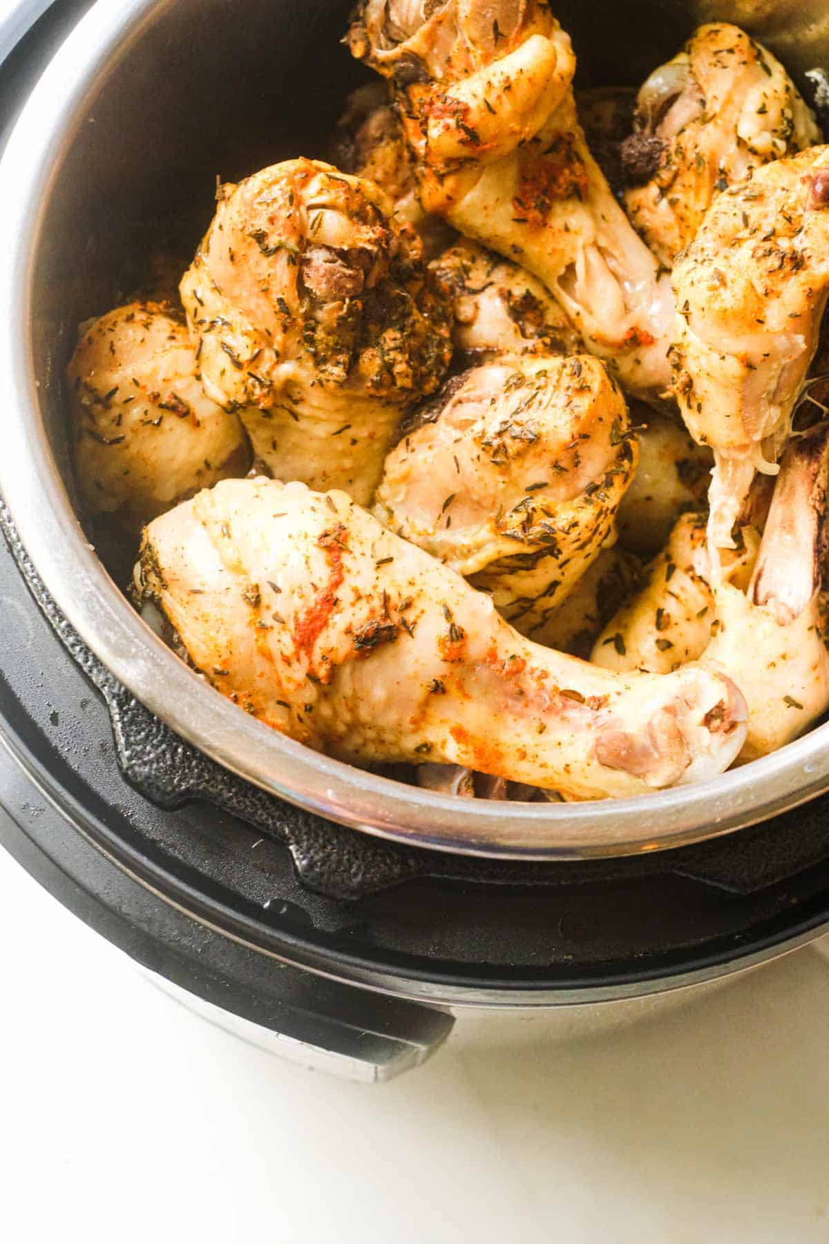 the cooked instant pot chicken drumsticks inside the instant pot