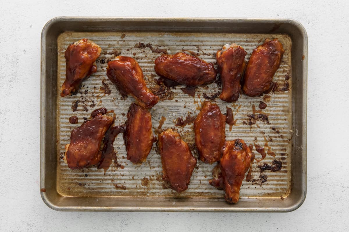 top down view of the cooked korean chicken wings on a baking sheet