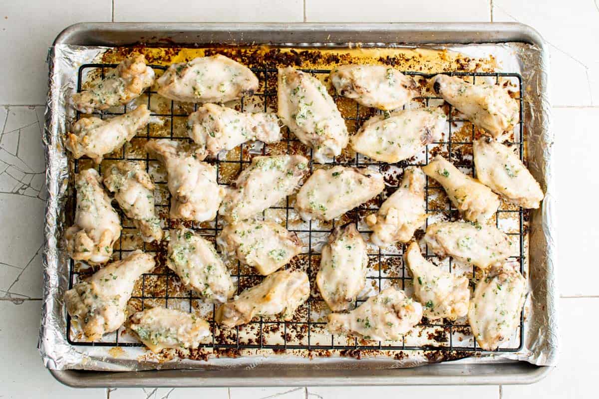 the cooked garlic parmesan wings on baking tray