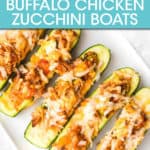a row of zucchini boats on a rectangular plate