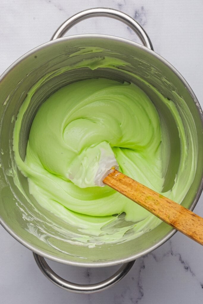 the green colored dip ready to be garnished and served.